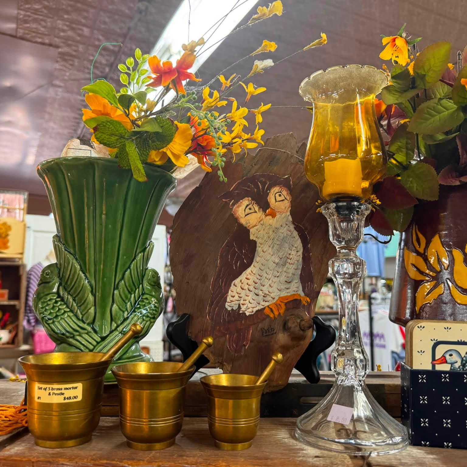 Vases, figurines, and art decor inside the shop